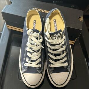 Only worn a couple of times.  Navy Converse